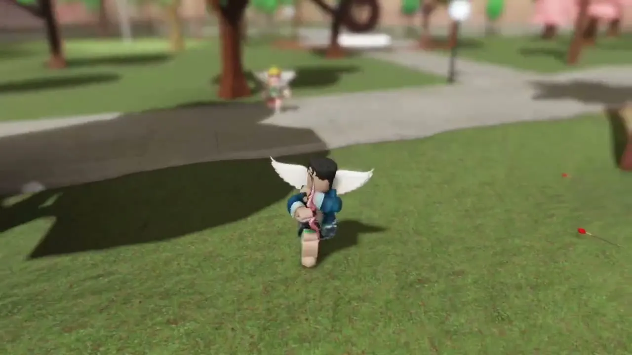 Cupido volando sobre el parque